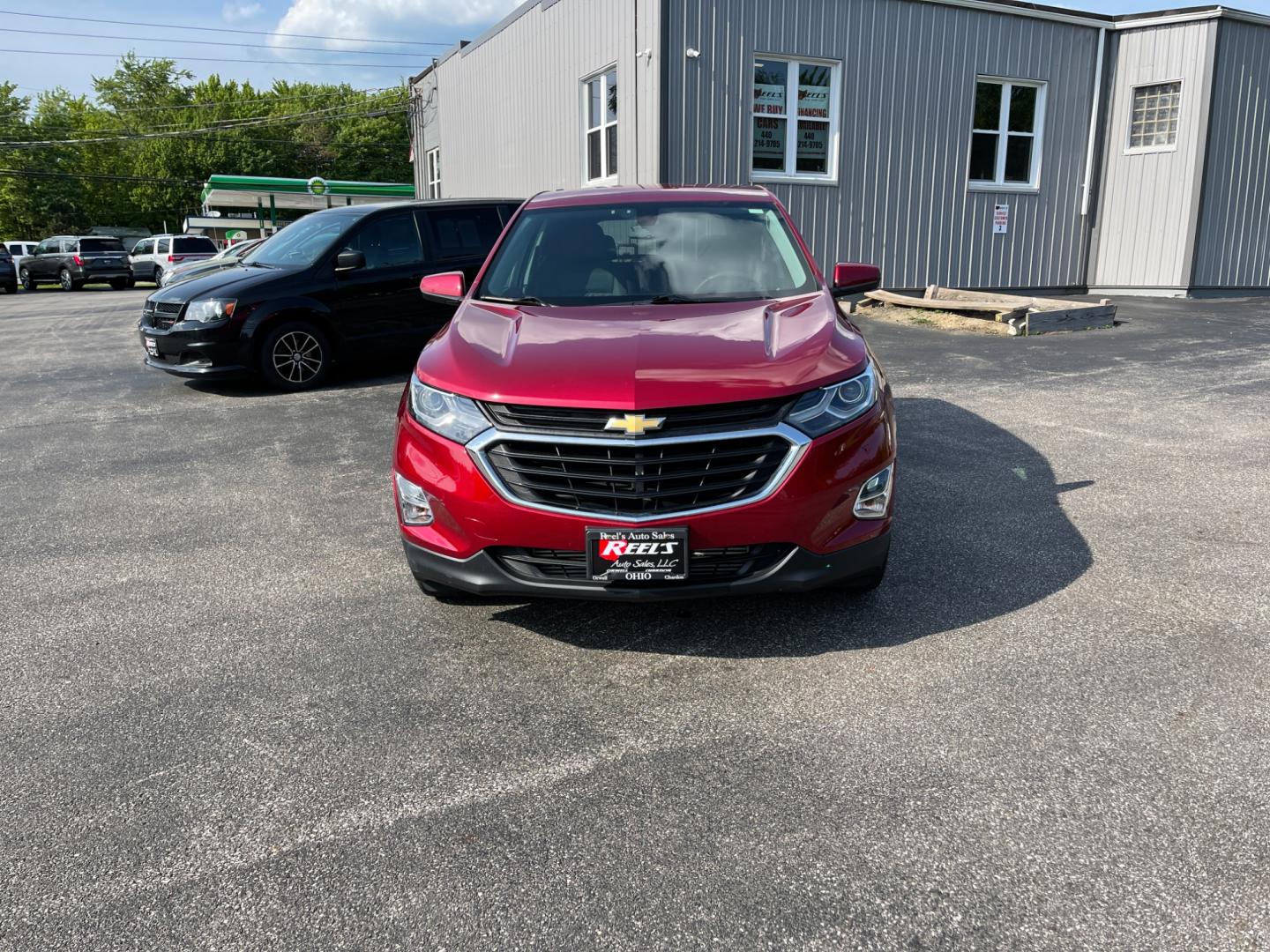 2018 Red /Black Chevrolet Equinox LT AWD (2GNAXSEV2J6) with an 1.5L I4 DOHC 16V TURBO engine, 6-Speed Automatic transmission, located at 11115 Chardon Rd. , Chardon, OH, 44024, (440) 214-9705, 41.580246, -81.241943 - This 2018 Chevrolet Equinox LT AWD with a 1.5L EcoTec Turbocharged engine and 6-speed automatic transmission offers a balanced blend of performance and fuel efficiency with a 30 MPG highway rating. This compact SUV is well-equipped for safety and convenience, featuring blind spot monitoring, rear cr - Photo#1